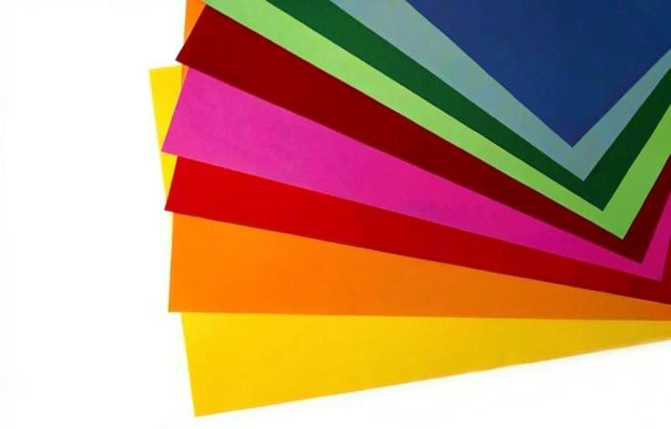 Fanned sheets of coloured paper
