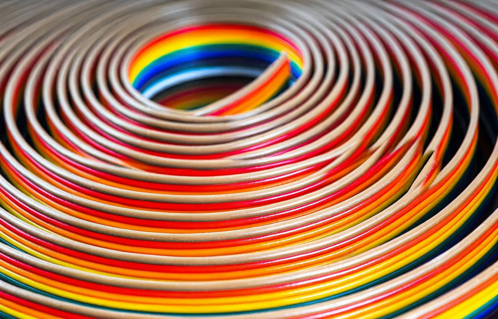 Coiled coloured PVC tubing in close-up