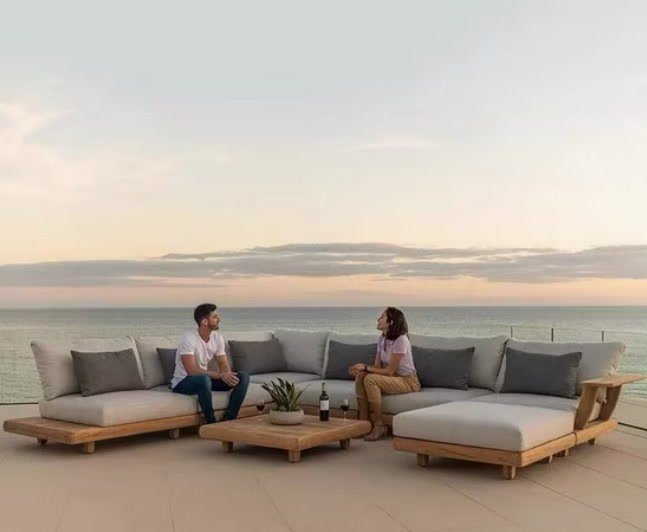 Outdoor sofa set on a terrace at dusk